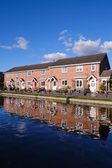 Fototapeta premium Modern canal-side houses in Great Britain