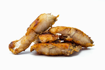 Pieces of fried fish on a white background.