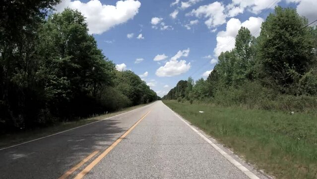 Rear POV FPV driving on a rural country road reverse flip effect wrong direction