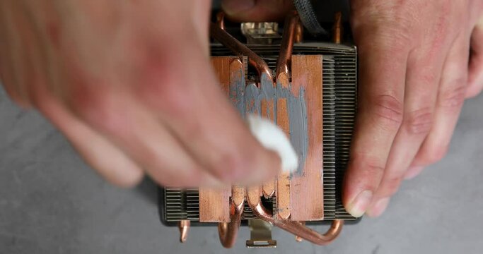 cleaning thermal paste of processor fan 