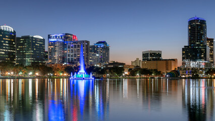 Fototapeta na wymiar Orlando city at night with fountain in Florida, USA 