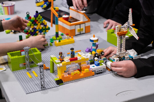 Tallinn, Estonia - May 6, 2023: Moving Lego robot built by kids. At First Lego League children build robots and solve robotics challenges.