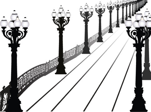 street lapms and fence near road