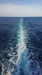  Water ripples from the ship and blue sky