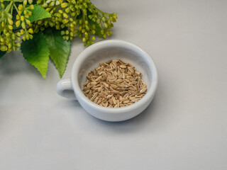fennel seeds in the cup on the table