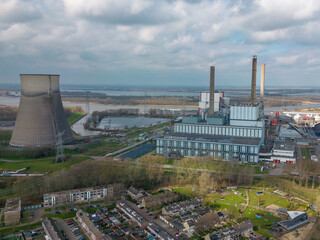Obraz premium This aerial drone photo shows the amercentrale in the Netherlands. This power station delivers energy through coal and biomass.