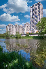 Fototapeta na wymiar Residential complex with a lake and a park