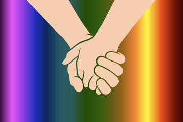 Two people are holding hands tightly on a rainbow background. Concept of love, friendship, closeness and strong connection between people