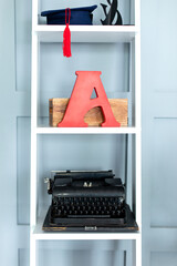 Stylish Typewriter machine in retro style. Journalist concept. Modern interior decor study room....