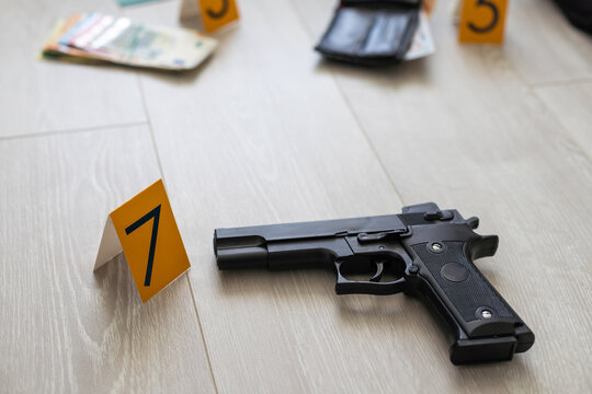 High contrast image of a crime scene with evidence markers