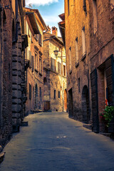 Fototapeta na wymiar Narrow street in old town Montepulciano Tuscany, Italy