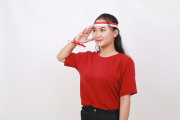 Young Indonesian girl celebrate indonesia independence day with respect gesture