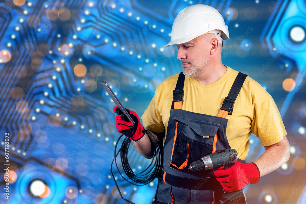 Poster man engineer. electrician with tablet and wire. worker near giant digital circuit board. network equ