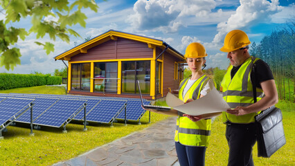 Builders near house. Solar panels on lawn. Man and woman work as engineers. Solar panel...