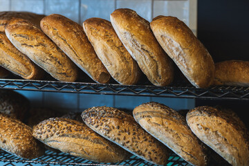 Different types of fresh bread storaged in a bakery