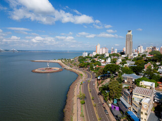 Fototapeta premium Aerial view of the city Posadas in the interior of Argentina. Buildings, vegetation and urban life.