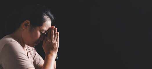 Christian life crisis prayer to god. Woman Pray for god blessing to wishing have a better life. woman hands praying to god with the bible. begging for forgiveness and believe in goodness.