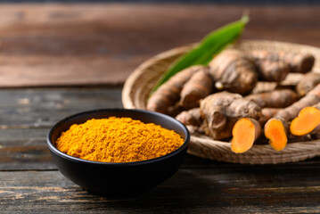 Turmeric powder and fresh turmeric (Curcuma, curcumin), Organic ingredient in Asian cuisine, food...