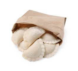 Paper bag of raw dumplings (varenyky) with tasty filling on white background