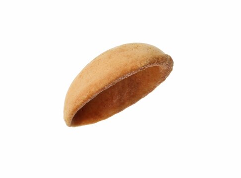 Half of delicious nut shaped cookie isolated on white