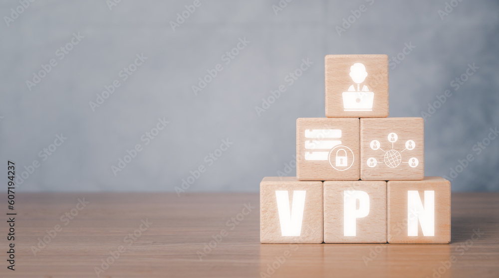 Poster vpn virtual private network protocol concept, wooden block on desk with vpn icon on vr screen.