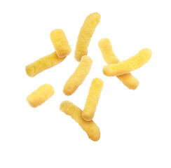 Many tasty corn sticks falling on white background