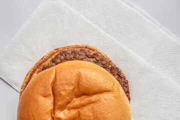 plain hamburger with natural shadow. stock photo