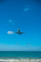 Fototapeta na wymiar airplane with color sky in sunny day time