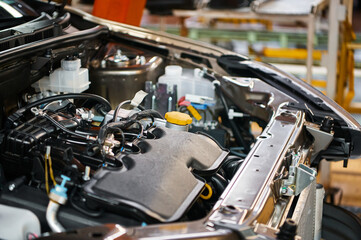 Fototapeta premium Open car compartment with different details in workshop