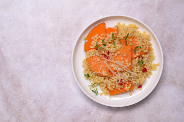 Pasta with fried pumpkin slices