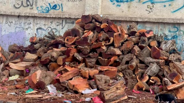 Pile of wood in front of bakery in Sana'a Yemen during fuel crisis humanitarian situation