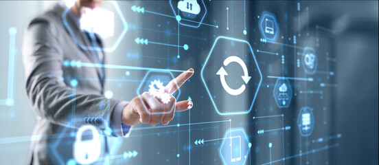 Businessman is touching icon Update software application. Hardware upgrade technology concept