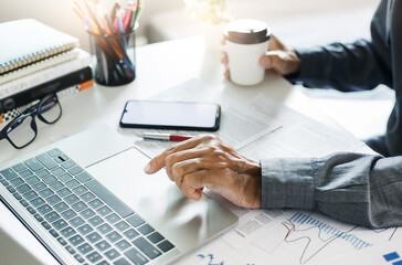 Asian businessman meeting together online via laptop computer to summarize and plan investment finances, they are the founders of the company. New business administration concept