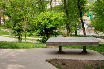Fototapeta na wymiar Bench in the summer park.