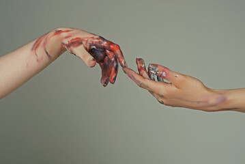 Painted hands. Reach hand. Sensual touch fingers. Two hands trying to touch. Adam sign. Human...