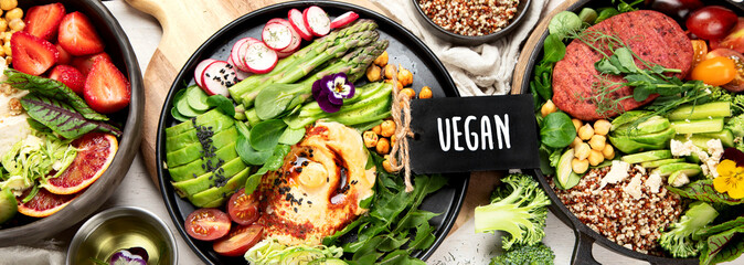 Healthy vegetarian and vegan  salads and Buddha Bowls with vitamins, antioxidants, protein on light...