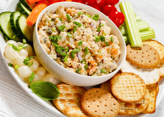 salmon salad with fresh veggies and crackers