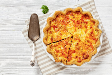 quiche with cheese and bacon filling on plate