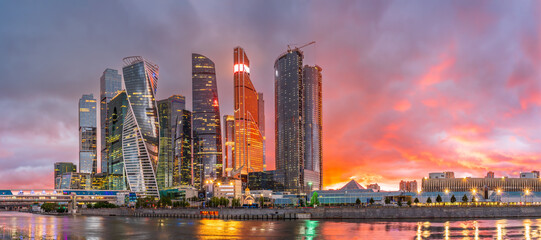High buildings of Moscow-City at Moskva River at summer sunset, Russia.
