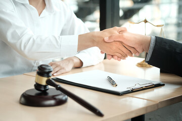 Lawyer handshake with client. Business partnership meeting successful concept.