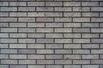 Dark gray tone brick wall. Stone wall paper surface. gray stone brick material. 