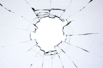 Hole in the glass, broken window with cracks texture. Effect of broken transparent glass