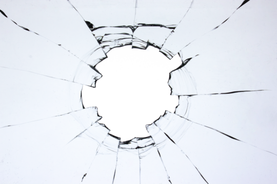 Hole in the glass, broken window with cracks texture. Effect of broken transparent glass