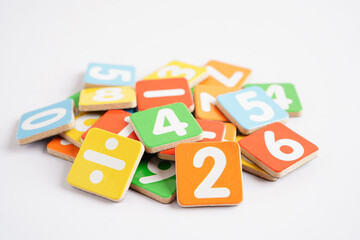 Number wood block cubes for learning Mathematic, education math concept..