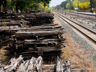 Old exchanged wooden railway sleepers stored for further use