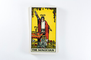 Naklejka na ściany i meble Tarot cards, Rider Waite tarot cards, the magician vintage card in the foreground.