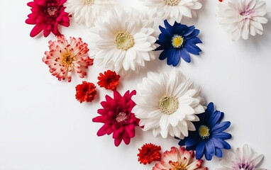 A white, red, and blue flower arrangement is on a white background