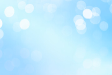 Obraz premium Beautiful White Bokeh Light De-focused A Blue Abstract Background. Celebration Festive, Circles Blurred White Space. 