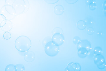 Beautiful Defocused Transparent Blue Soap Bubbles. Abstract Background. White Space. Celebration Festive Backdrop. Freshness Soap Suds Bubbles Water