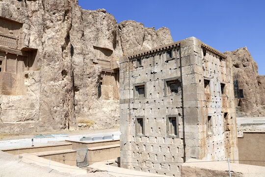 Royal tombs and Cube of Zoroaster (Ka'ba-ye Zartosht ) in ancient necropolis Naqsh-e Rustam, Achaemenid dynasty, Fars province, Iran. UNESCO world heritage site